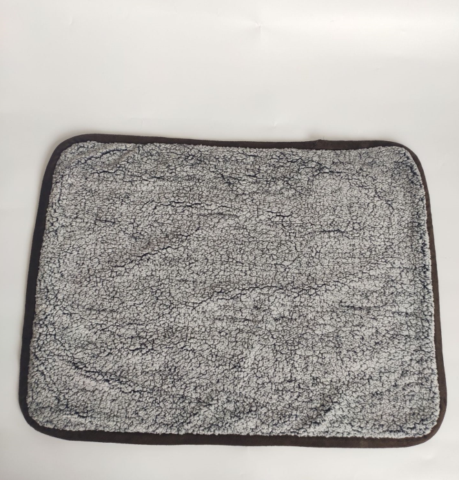 Gray sherpa-style reverse side of the BarkMiles waterproof dog travel blanket